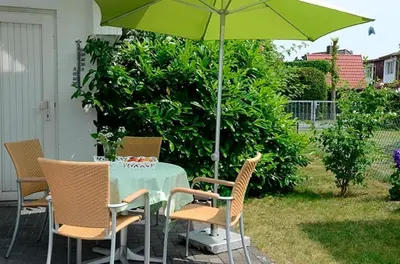 Ein Garten an der Unterkunft Strandperle 9, PP außen