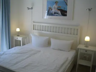 Ein Bett oder Betten in einem Zimmer der Unterkunft Carolin