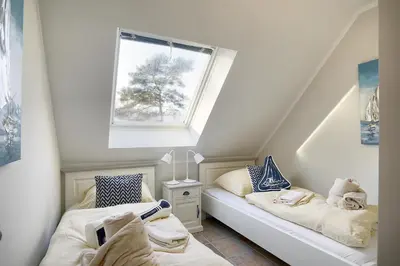 Ein Bett oder Betten in einem Zimmer der Unterkunft 54 Grad Nord