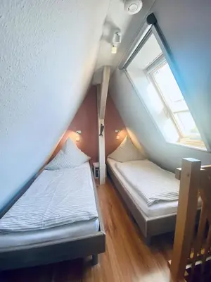 Ein Bett oder Betten in einem Zimmer der Unterkunft Trafohaus