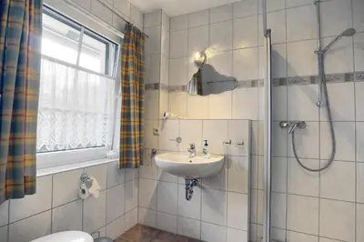 Ein Badezimmer in der Unterkunft Kranichguck, App 2