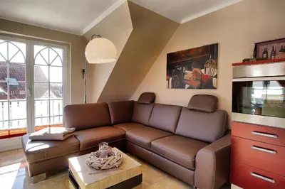 Ein Sitzbereich in der Unterkunft Villa Sonnenuhr, FW 8