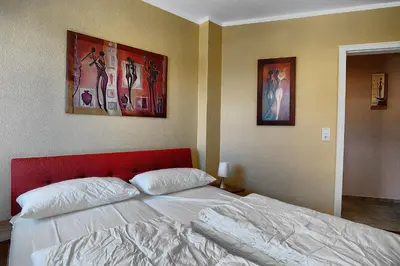 Ein Bett oder Betten in einem Zimmer der Unterkunft Villa Sonnenuhr, FW 8