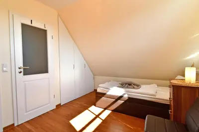 Ein Bett oder Betten in einem Zimmer der Unterkunft Haus Strandmuschel