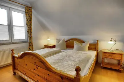 Ein Bett oder Betten in einem Zimmer der Unterkunft Ostseewelle Whg 3