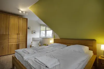 Ein Bett oder Betten in einem Zimmer der Unterkunft Dat suutsche Huus