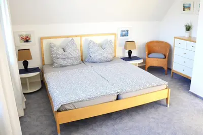 Ein Bett oder Betten in einem Zimmer der Unterkunft Haus Birnbaum