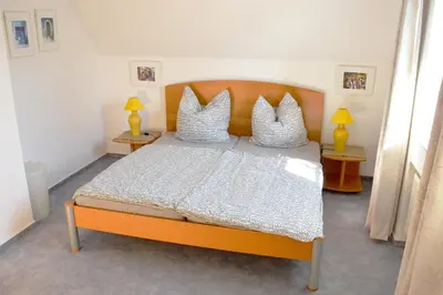 Ein Bett oder Betten in einem Zimmer der Unterkunft Haus Birnbaum