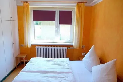 Ein Bett oder Betten in einem Zimmer der Unterkunft Windspiel, FW 3