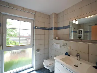 Ein Badezimmer in der Unterkunft Haus Regenbogen