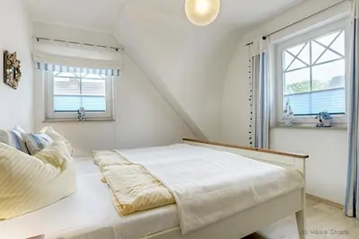 Ein Bett oder Betten in einem Zimmer der Unterkunft Villa Sola Bona, FW 4