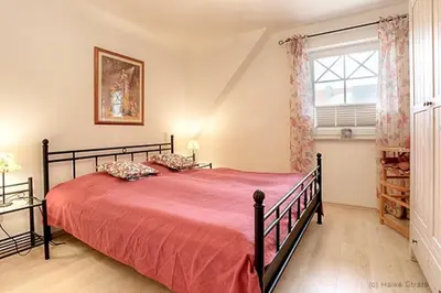 Ein Bett oder Betten in einem Zimmer der Unterkunft Villa Sola Bona, FW 4