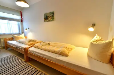Ein Bett oder Betten in einem Zimmer der Unterkunft Ostseewelle Whg 2