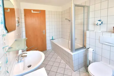 Ein Badezimmer in der Unterkunft Ostseewelle Whg 8