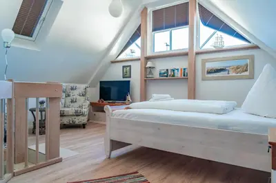 Ein Bett oder Betten in einem Zimmer der Unterkunft Gänseblümchen, FW 3