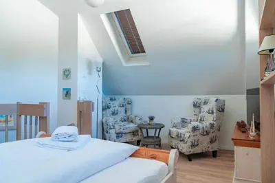 Ein Bett oder Betten in einem Zimmer der Unterkunft Gänseblümchen, FW 3