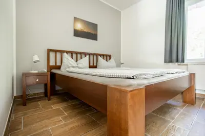 Ein Bett oder Betten in einem Zimmer der Unterkunft DER STÖRTEBEKER - 