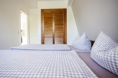 Ein Bett oder Betten in einem Zimmer der Unterkunft DER STÖRTEBEKER - 