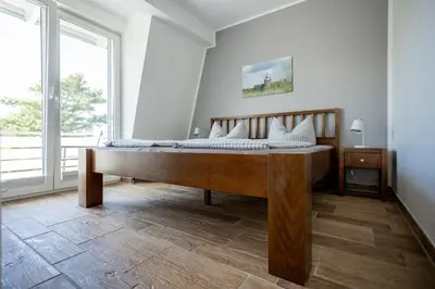Ein Bett oder Betten in einem Zimmer der Unterkunft DER STÖRTEBEKER - 