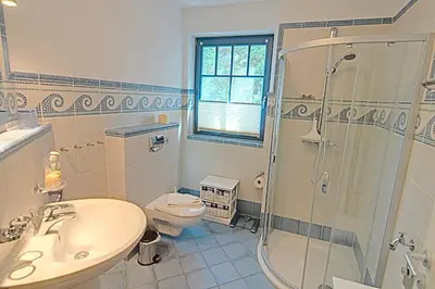 Ein Badezimmer in der Unterkunft Villa Birkenboom, FW 1