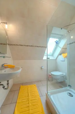 Ein Badezimmer in der Unterkunft Strandglück FH 4