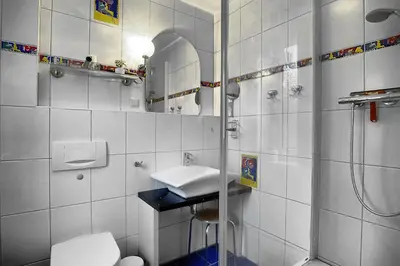 Ein Badezimmer in der Unterkunft Strandläufer