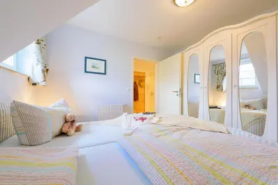 Ein Bett oder Betten in einem Zimmer der Unterkunft Arielle Nr 6 - für die schönste Zeit des Jahres -