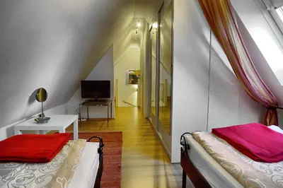 Ein Bett oder Betten in einem Zimmer der Unterkunft Catherin