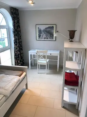 Ein Bett oder Betten in einem Zimmer der Unterkunft Catherin