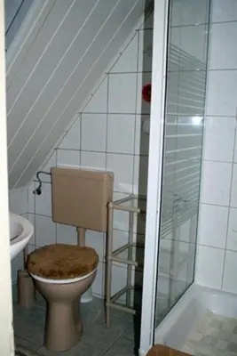 Ein Badezimmer in der Unterkunft Voß, FW