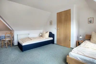 Ein Bett oder Betten in einem Zimmer der Unterkunft Ostseewelle Whg 7