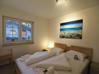 Ein Bett oder Betten in einem Zimmer der Unterkunft Villa Sola Bona, FW 2