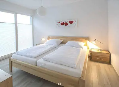 Ein Bett oder Betten in einem Zimmer der Unterkunft Kaeptn Brass Strandurlaub max 4 Personen