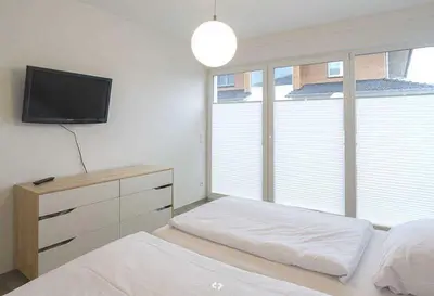 Ein Bett oder Betten in einem Zimmer der Unterkunft Kaeptn Brass Strandurlaub max 4 Personen