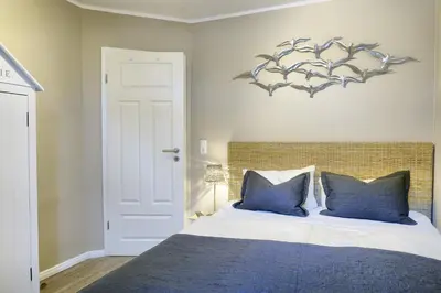 Ein Bett oder Betten in einem Zimmer der Unterkunft Villa Vogelsang, Pier 6
