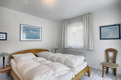 Ein Bett oder Betten in einem Zimmer der Unterkunft Strandkieker 13, PP innen