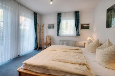 Ein Bett oder Betten in einem Zimmer der Unterkunft Strandkieker 14, PP innen
