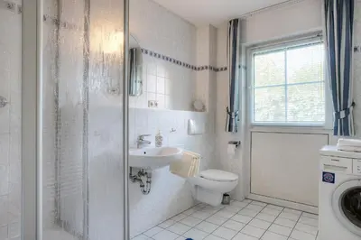 Ein Badezimmer in der Unterkunft Strandkieker 14, PP innen