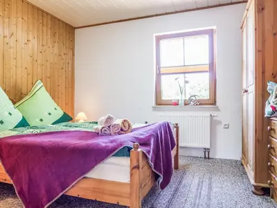 Ein Bett oder Betten in einem Zimmer der Unterkunft Streubel Prerow