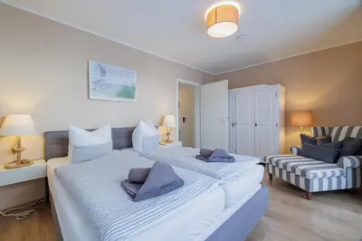 Ein Bett oder Betten in einem Zimmer der Unterkunft Boddenkieker 12