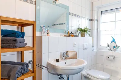 Ein Badezimmer in der Unterkunft Birkenstraße 7, Wohnung 7