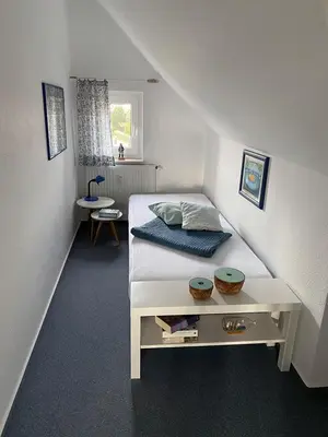 Ein Bett oder Betten in einem Zimmer der Unterkunft Antonia Strandstr 21 Whg 6
