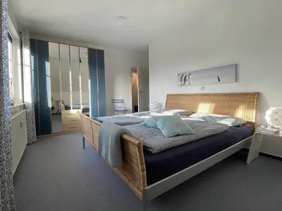 Ein Bett oder Betten in einem Zimmer der Unterkunft Antonia Strandstr 21 Whg 6