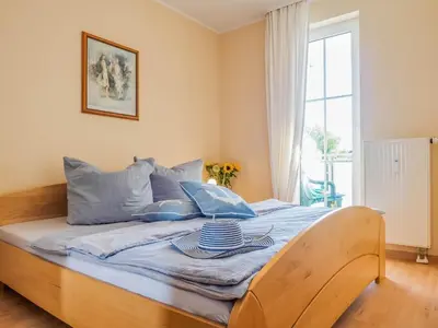 Ein Bett oder Betten in einem Zimmer der Unterkunft Strandstraße 51 Whg 1