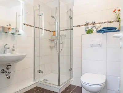Ein Badezimmer in der Unterkunft Strandstraße 51 Whg 1