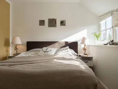 Ein Bett oder Betten in einem Zimmer der Unterkunft Ferienhaus 
