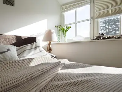 Ein Bett oder Betten in einem Zimmer der Unterkunft Ferienhaus 