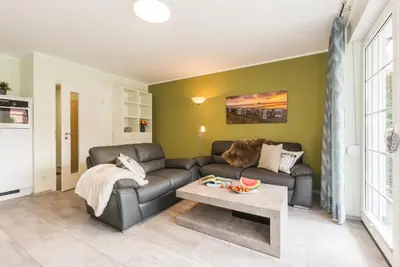 Ein Sitzbereich in der Unterkunft Birkenstraße 6 Haus II Whg2