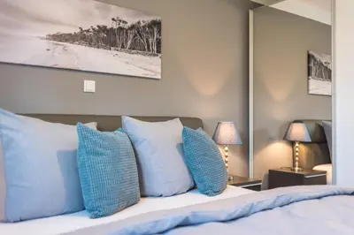 Ein Bett oder Betten in einem Zimmer der Unterkunft Birkenstraße 6 Haus II Whg3