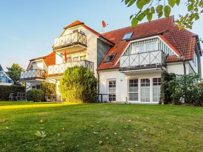 Ein Garten an der Unterkunft Birkenstraße 6 Haus II Whg6